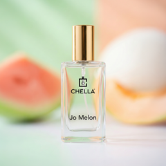 Chella Jo Melon perfume bottle with a watermelon in the background