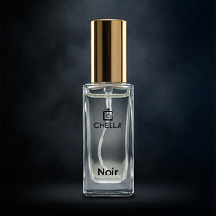 Perfume bottle labeled 'Chella Noir' with a gold cap on a dark background