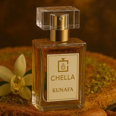 Perfume bottle labeled 'Chella Kunafa' with kunafa rolls and an orchid on a textured surface.