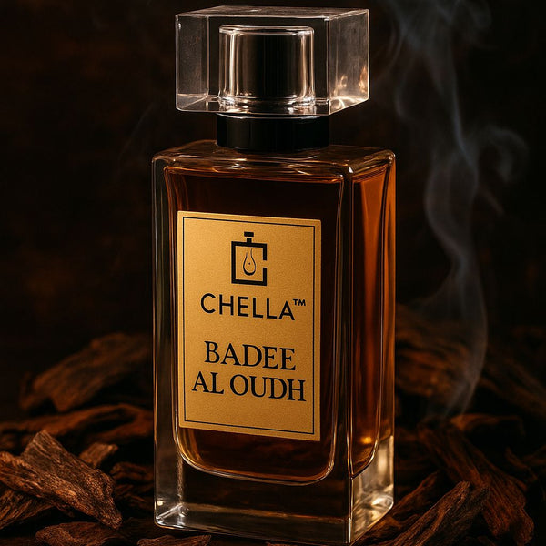 Chella Badee Al Oudh perfume bottle with smoke effect on a dark background