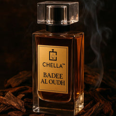 Chella Badee Al Oudh perfume bottle with smoke effect on a dark background